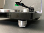Just raise the Monolith turntable to adjust the height of the Mnpctech isolation feet so you can level the turntable.